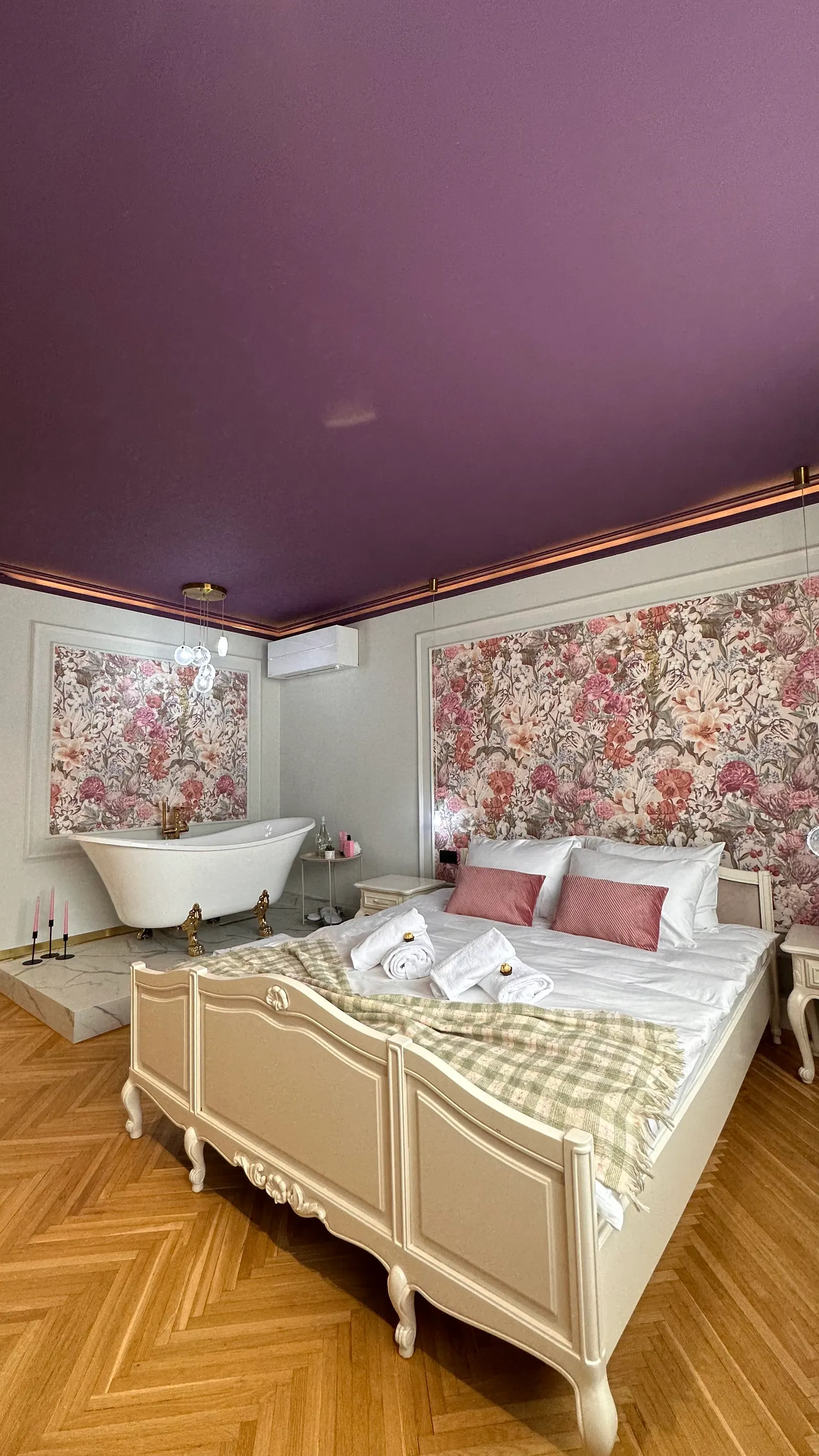 Romantic Apartment bedroom with view of the freestanding soaking tub