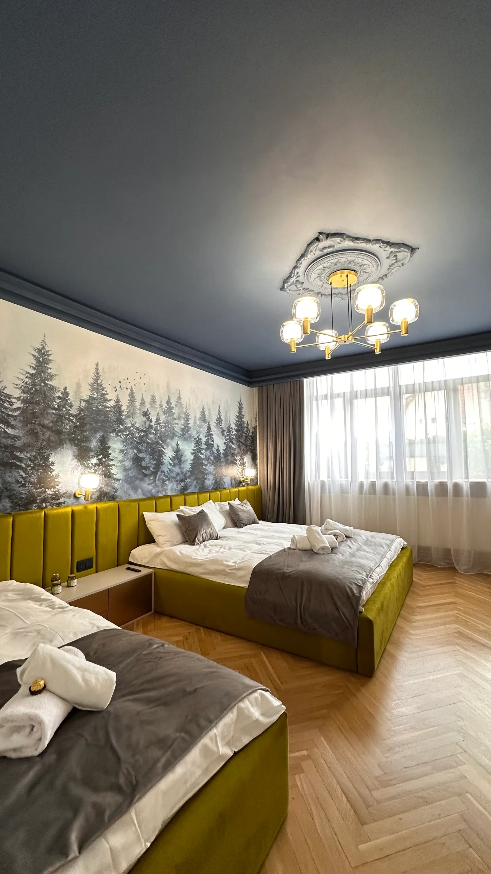 Forest Apartment bedroom with forest mural